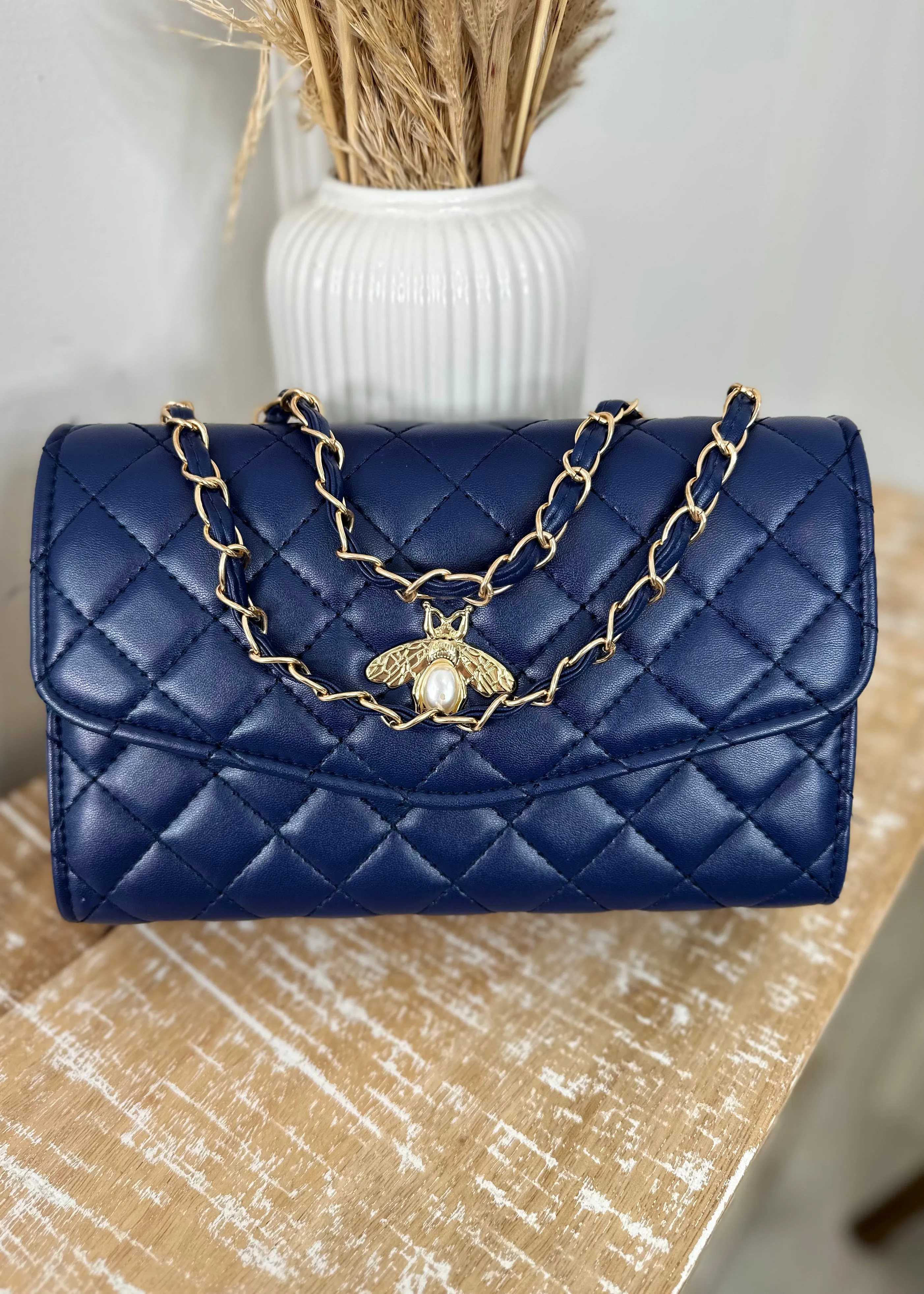 Dakota Navy Bee Clasp Bag